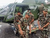 What caused Nepal’s devastating flood damage and how was it contained?