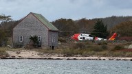 Woman who escaped from boat fire off Cape Cod with her husband and son dies at a hospital