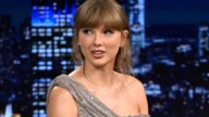 Taylor Swift stuns in a sexy sequined dress and matching heels as new album breaks records