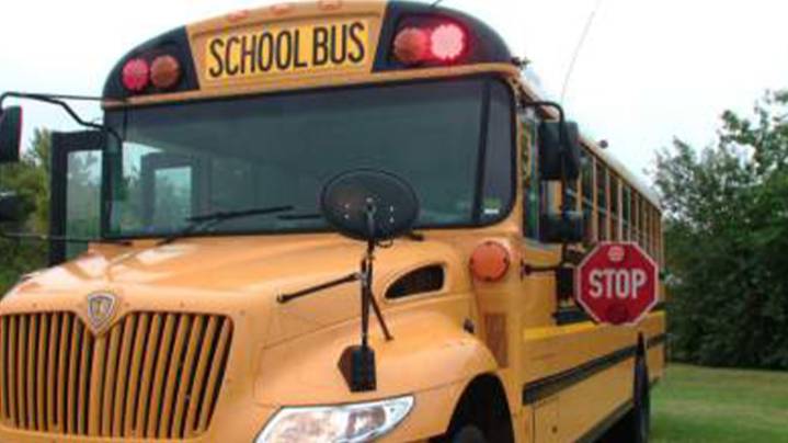 Child injured by truck, attempting to load school bus