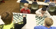 Young players learn chess Jefferson library