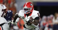 No. 10 Georgia overcomes slow start to beat Auburn for ninth straight time