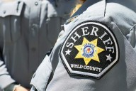 Semitrailer hits Weld County sheriff’s vehicle on side of I