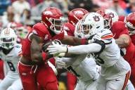 Quarterback change helps lift Auburn to first SEC win of season, beating Arkansas 33