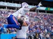 James Cook runs for 216 yards and 2 TDs, Allen accounts for 3 TDs as Bills rout Panthers 40