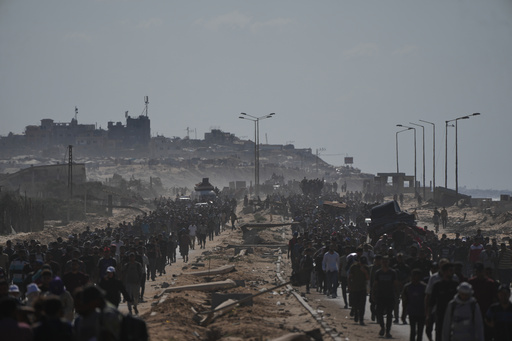Thousands of Palestinians return to what's left of their homes as Gaza ceasefire takes effect