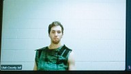 Man accused of killing Charlie Kirk can avoid wearing prison uniform in court but must be restrained