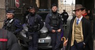 Inspector Clouseau? The mystery man in AP photo after Louvre jewel heist creates a buzz