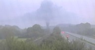 Live M5 traffic as HGV and electric vehicle fire close motorway