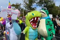At the No Kings protest, inflatable frogs and unicorns unite