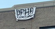 'BPHA slum landlords' banner hung from Cambridge flat building