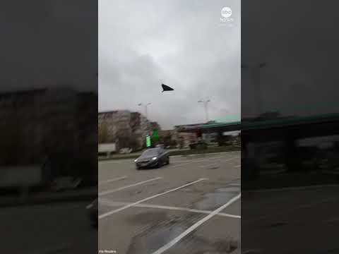 Moment a Russian drone strikes near an apartment building in Ukraine