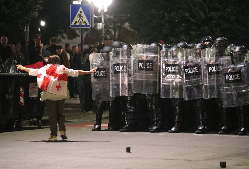 Georgian police use water cannon to repel protesters from presidential palace