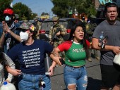 ICE agents, protesters clash in Chicago;