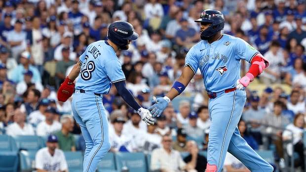 Guerrero outshines Ohtani, giving Blue Jays a 6-2 win to even World Series