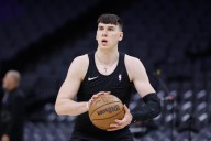 For Lakers’ Jake LaRavia, success is in the (mint condition) cards