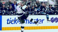 Clarke scores in 3rd, Kings hold off comeback from Sharks