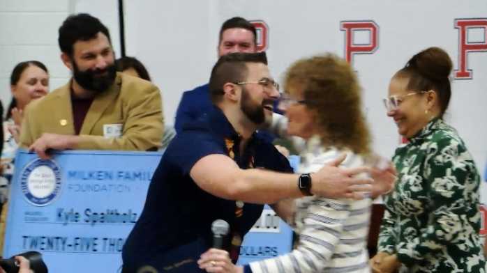 Portsmouth teacher receives prestigious award, $25,000 prize