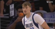 Flagg shines in NBA preseason debut