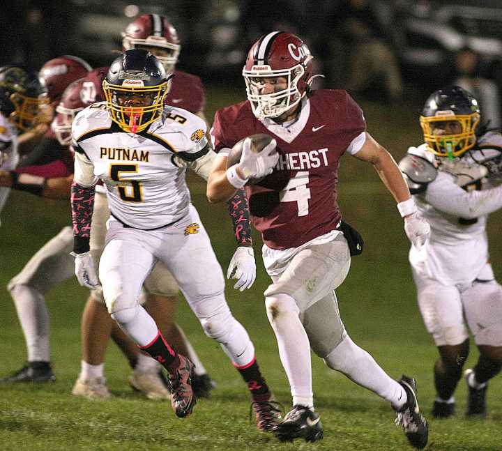 PHOTOS: Amherst football snaps losing streak against Putnam Tech