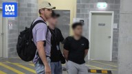 Police charge two men after raids on alleged safe houses used by South