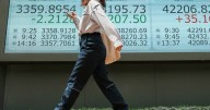 Asian stocks lift as markets digest US shutdown impact