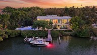 Waterfront Sarasota mansion with dock, saltwater pool for sale. Photos