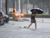Typhoon Matmo hits southern China during peak holiday season