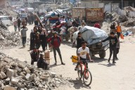 Israel cesa ofensiva en Gaza y los palestinos emprenden camino de regreso a sus hogares