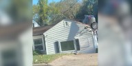 Car crashes into roof of Nashville home