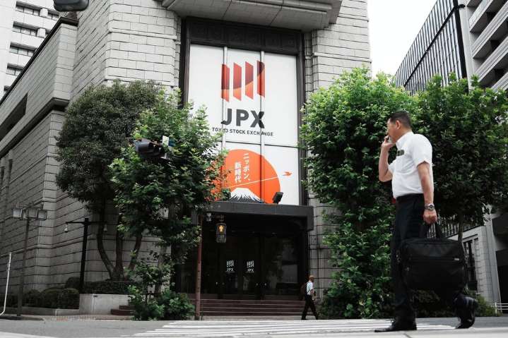 Asian shares are mostly higher after Wall St ends an erratic day with gains
