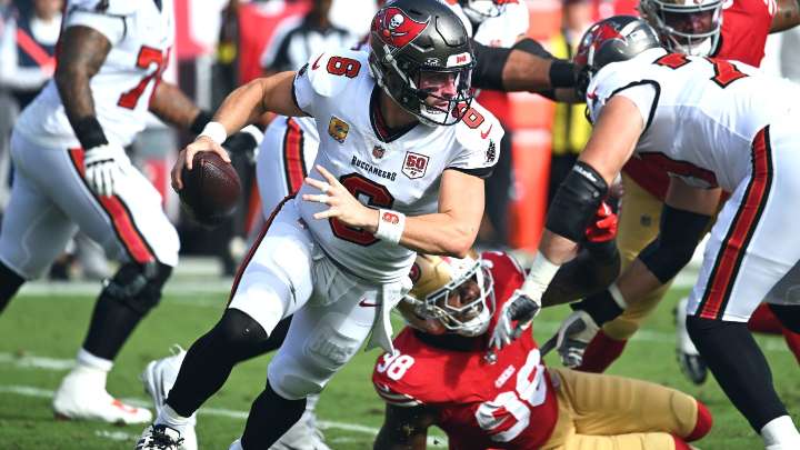 Mayfield tosses two TDs, Buccaneers cruise past injury