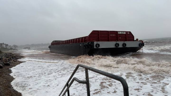 Barges run ashore on Woodmont Beach in Milford