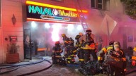 Fire heavily damages building housing Halal Munchies in Hicksville