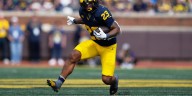 Michigan takes advantage of Washington turnovers, pulls away to win 24
