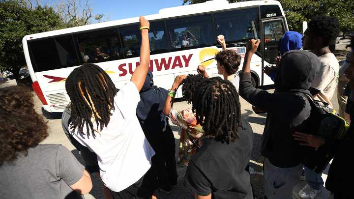See Hoggard girls tennis players leave for NCHSAA state championship