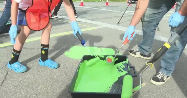 Volunteers brighten Rose Park crosswalk in quick