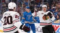 Reichel scores twice as the Blackhawks beat the Blues 8-3 while playing without Foligno
