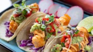 Bring A Briny Burst To Tacos With This Overlooked Canned Seafood