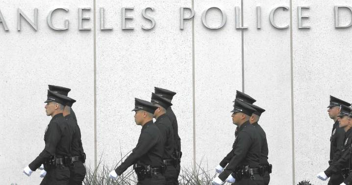 Woman charged with murder in connection with a body found in a burned Honda in South L.A.