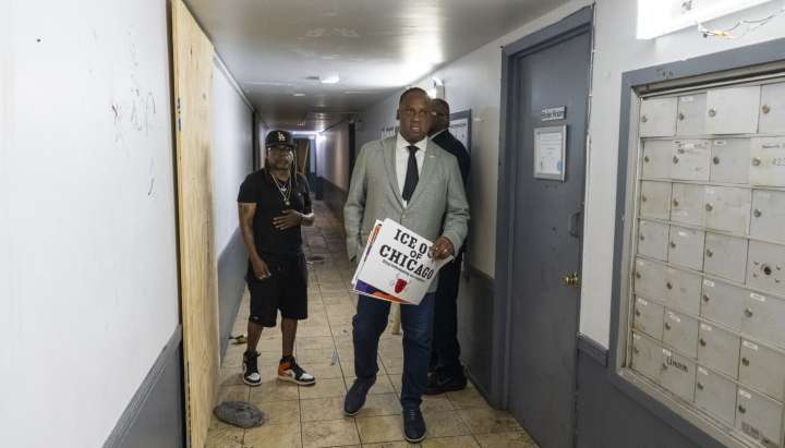 After military-style raid on South Shore apartment, Congress members rally around residents