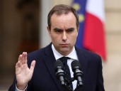 French prime minister backs suspending unpopular pension reform law