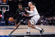 Short-handed Minnesota Timberwolves lose to Denver Nuggets 127