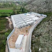 One year on, Italian migrant camps in Albania near