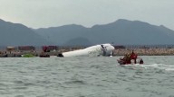 2 Killed After Emirates Cargo Plane Skids Off Hong Kong Runway Into Sea; Airport Shuts North Runway