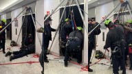 Firefighters hoist man 70-feet up elevator shaft in Boston office building
