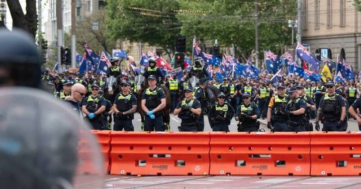 Police cop rocks, bottles as migration protesters clash