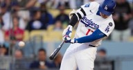 Ohtani homers to lead off Dodgers' NL Wild Card opener