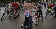 Naked bike riders demonstrate against federal troops