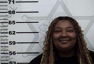 Oxford woman arrested on burglary charge after apartment disturbance